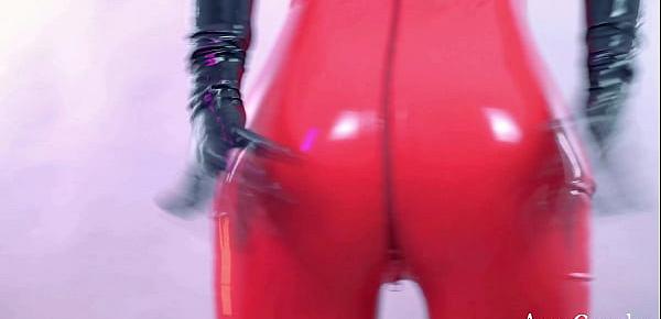 trendsAmazing hot Domme in red latex catsuit teasing close up shiny fetish clothes